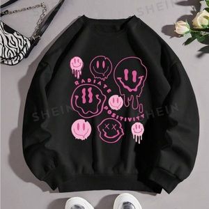 Black and Hot pink sweater with smily faces